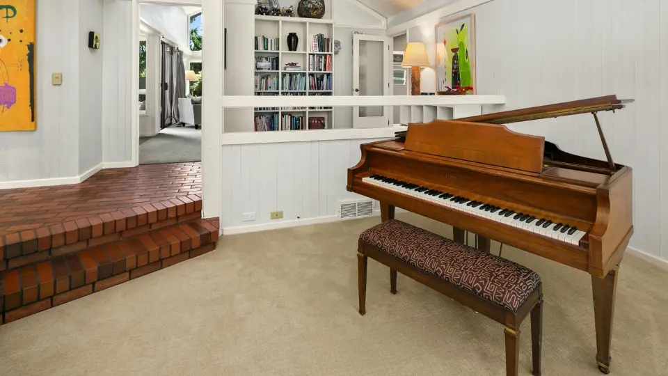 Wolf Moving's professional team carefully transports a grand piano in Raleigh with expertise and care