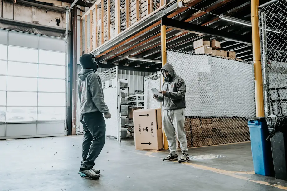 Wolf moving team members inside of the company storage facility