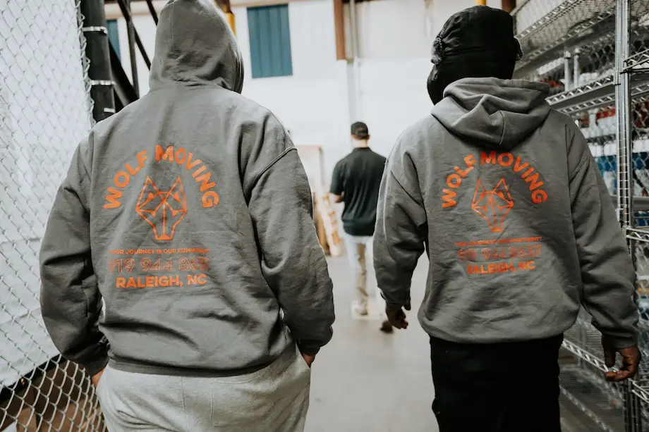 Wolf moving team in their storage services facility