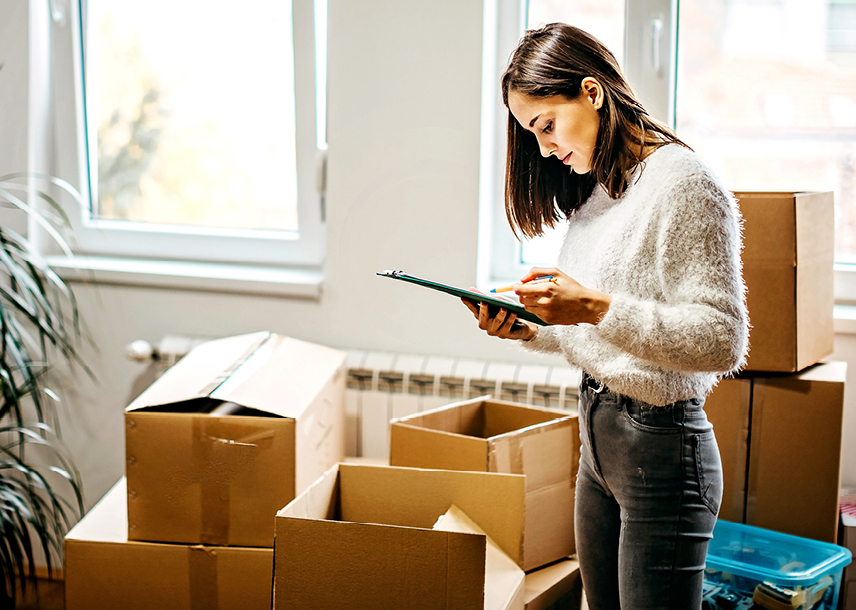 new house checklist for moving | Wolf Moving Woman moving out of her Raleigh NC home